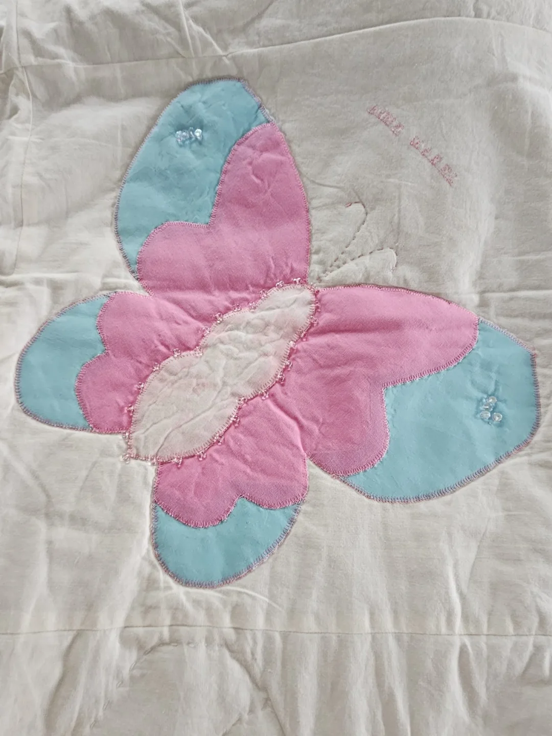 Vlinderquilt van Anne Marèl als symbool voor verbinding tijdens palliatieve fase, sterven, rouw en verlies binnen het gezin | Nicole Broers